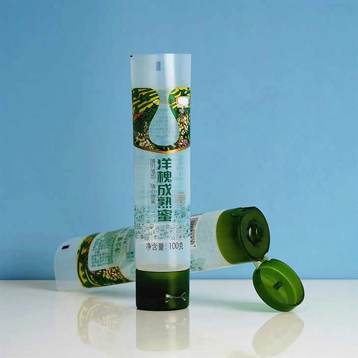 100g Custom Logo Cosmetic Packaging Squeeze Cosmetic Squeeze Container Plastic Food Grade Honey Packaging Tube